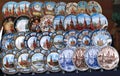 Painted colorful souvenir plates with the symbol of the Moscow